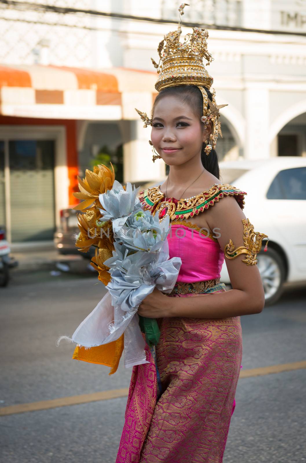 PHUKET, THAILAND - 07 FEB 2014: Beautiful girl take part in procession parade of annual old Phuket town festival. 