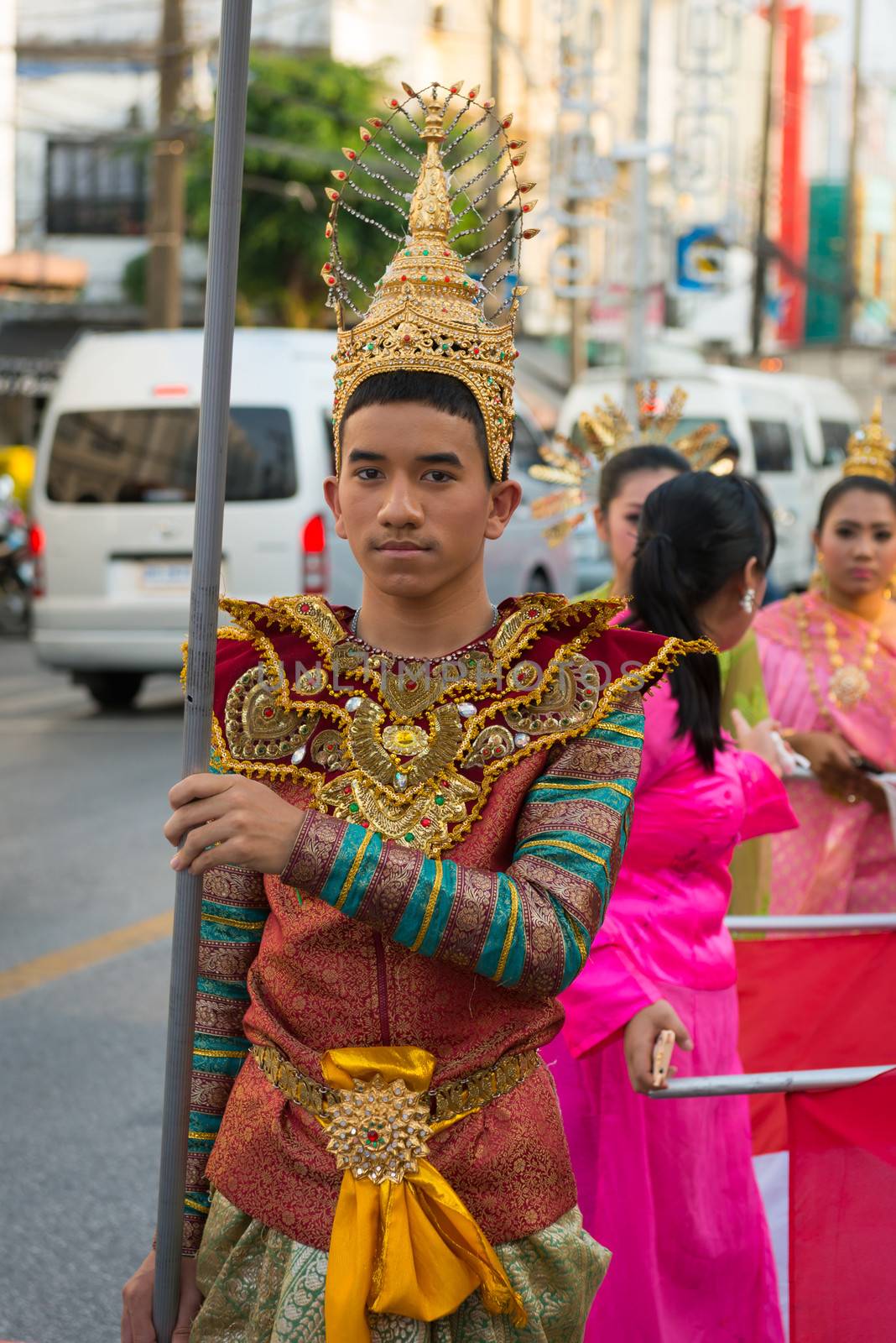 PHUKET, THAILAND - 07 FEB 2014: Phuket town residents take part in procession parade of annual old Phuket town festival. 
