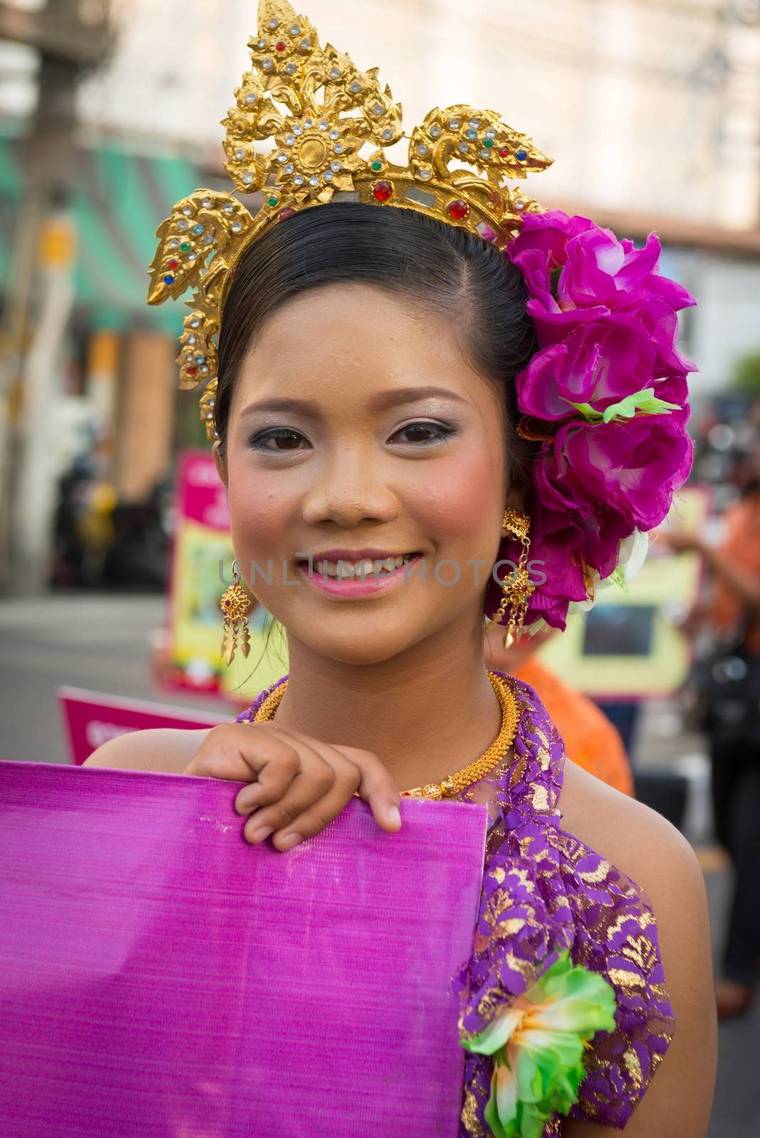 PHUKET, THAILAND - 07 FEB 2014: Beautiful girl takes part in procession parade of annual old Phuket town festival. 
