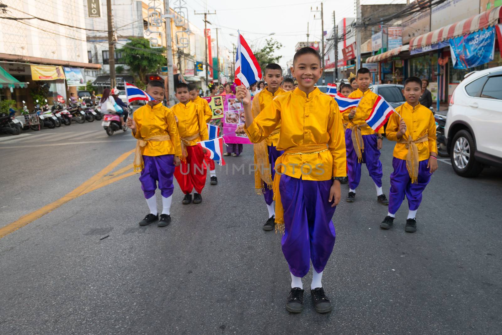 PHUKET, THAILAND - 07 FEB 2014: Children take part in procession parade of annual old Phuket town festival. 