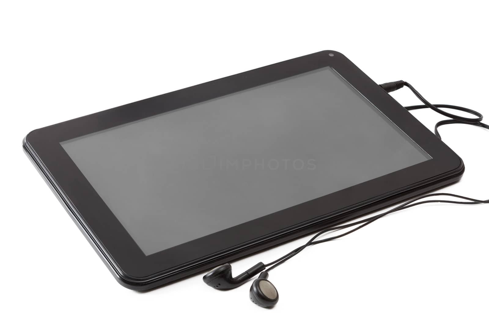 Tablet computer with headphones isolated on white background