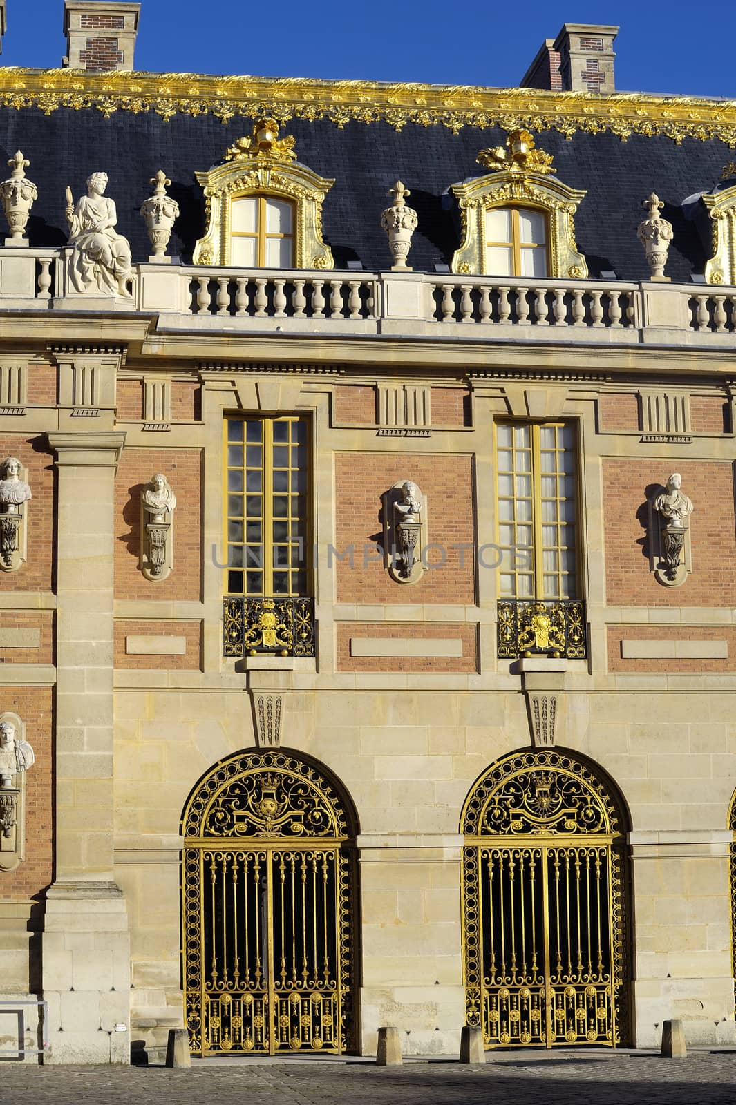 chateau de Versailles, architectural detail and gilding of the facade and roof
