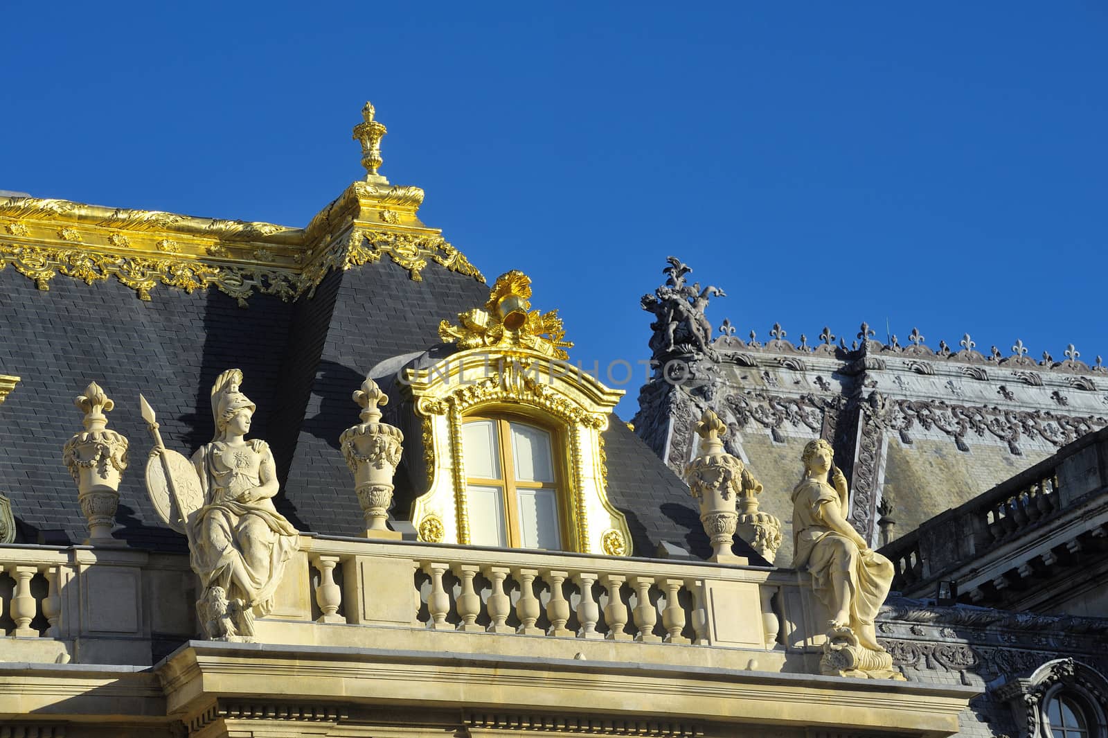 chateau de Versailles, architectural detail and gilding of the facade and roof