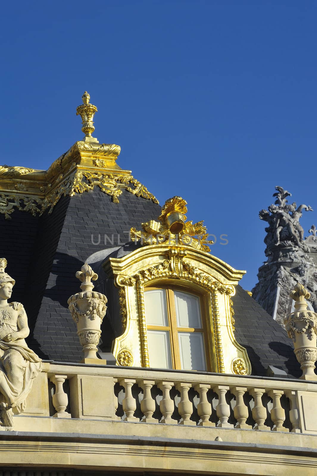 chateau de Versailles, architectural detail and gilding of the facade and roof
