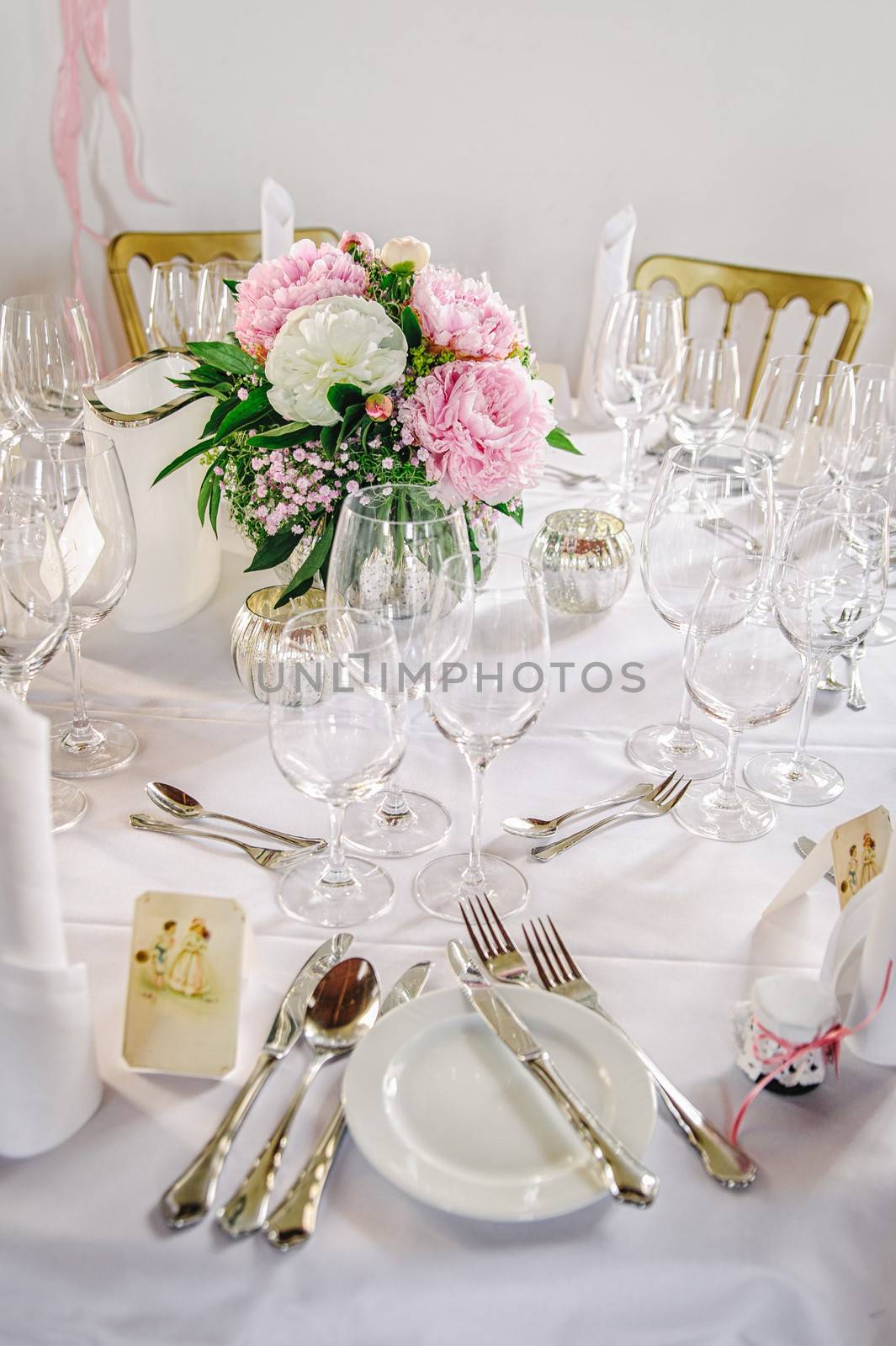 Table decor with flowers on a wedding ceremony