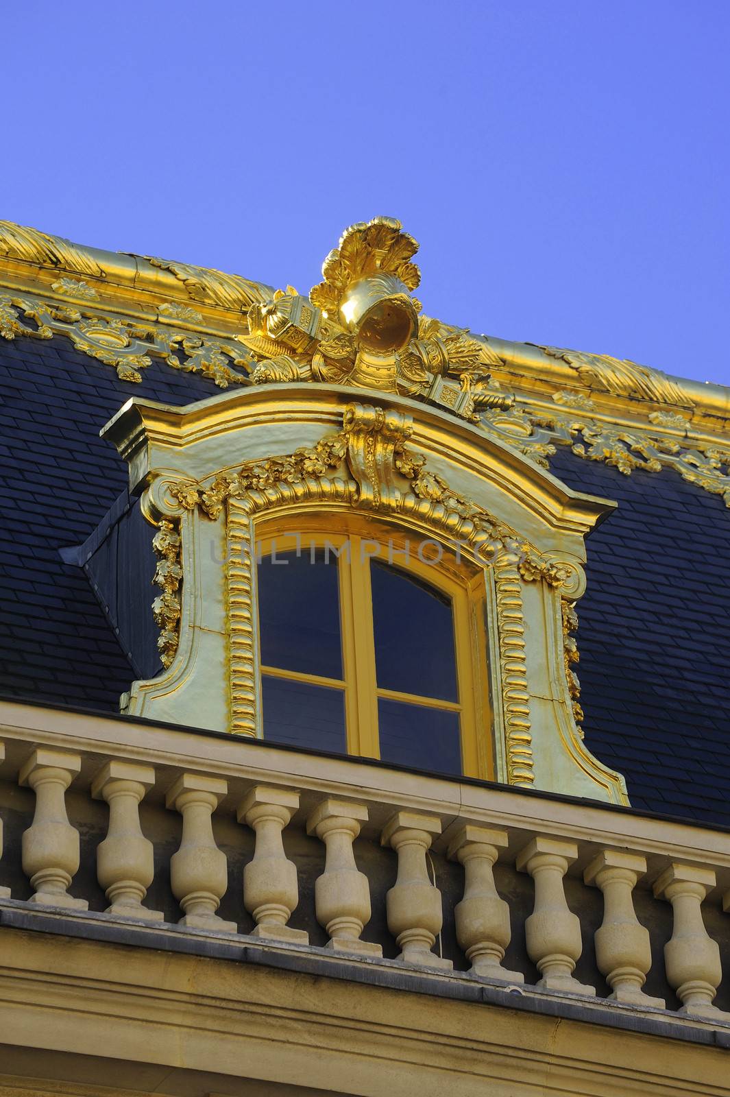 Castle of Versailles, architectural detail and gilding of the facade and roof
