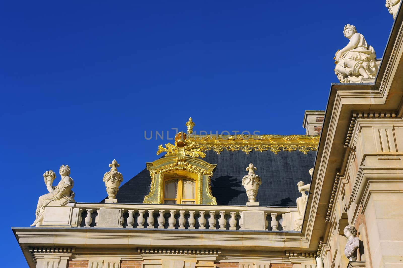 Castle of Versailles, architectural detail and gilding of the facade and roof