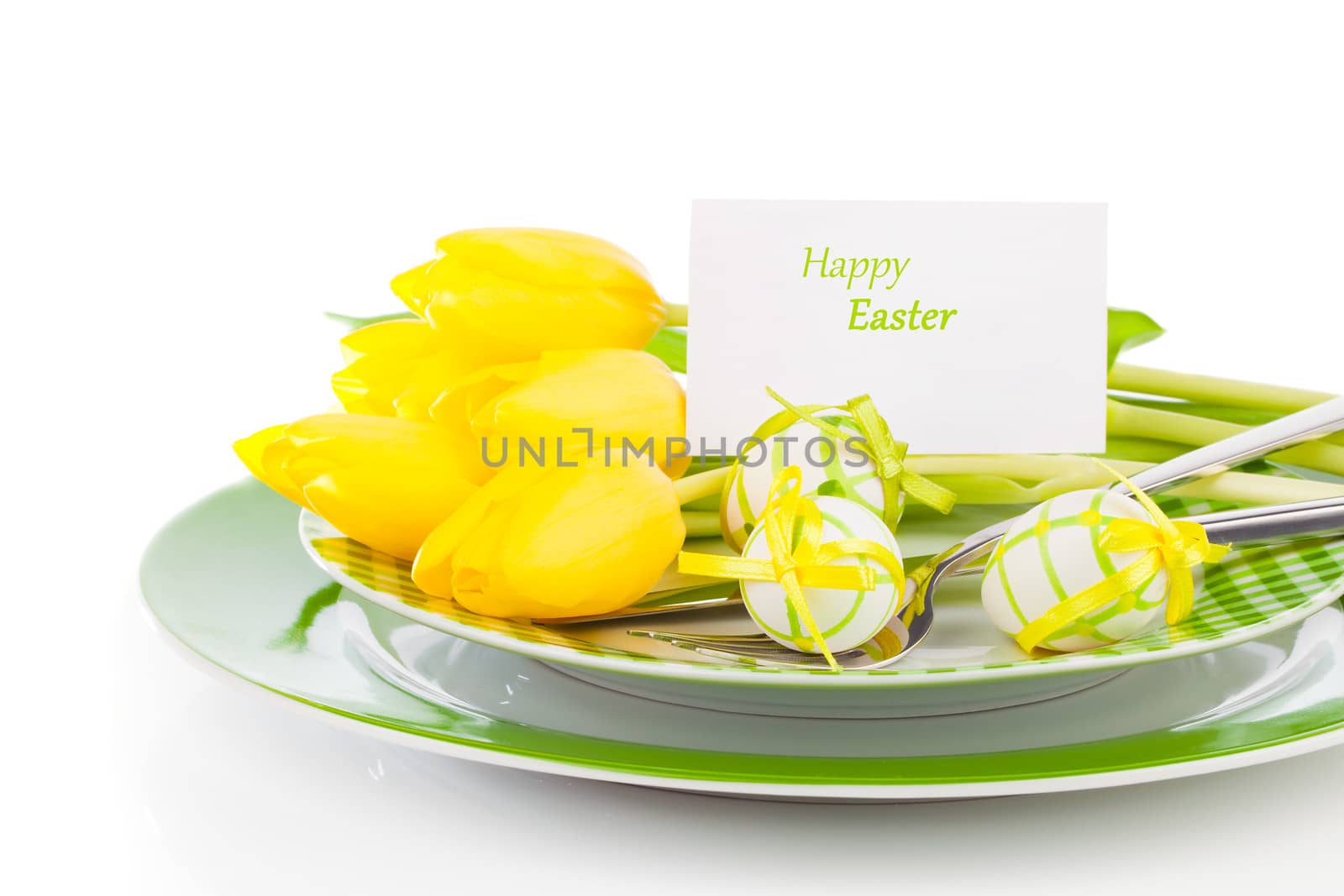 Easter eggs and blank for text in a plate, on a white background