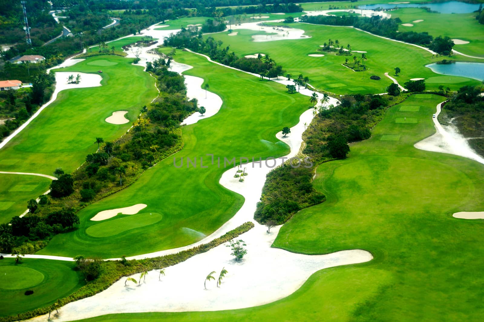 Flying above a golf course at an exotic destination