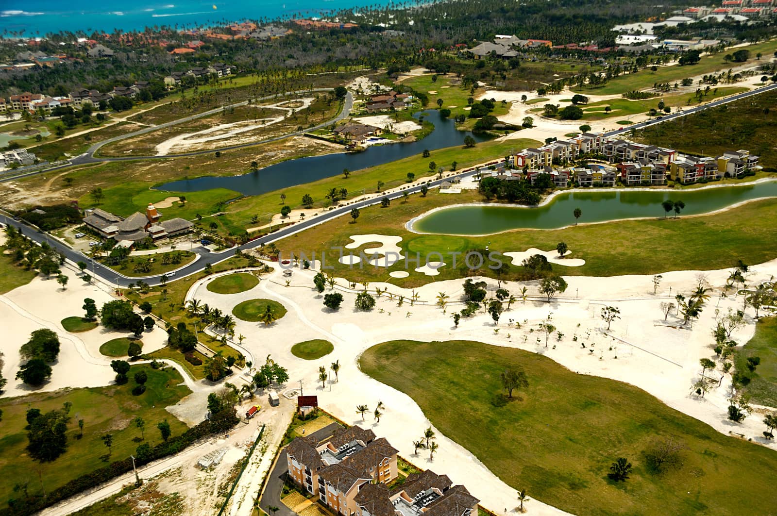 Elevevated view of golf course by cfoto