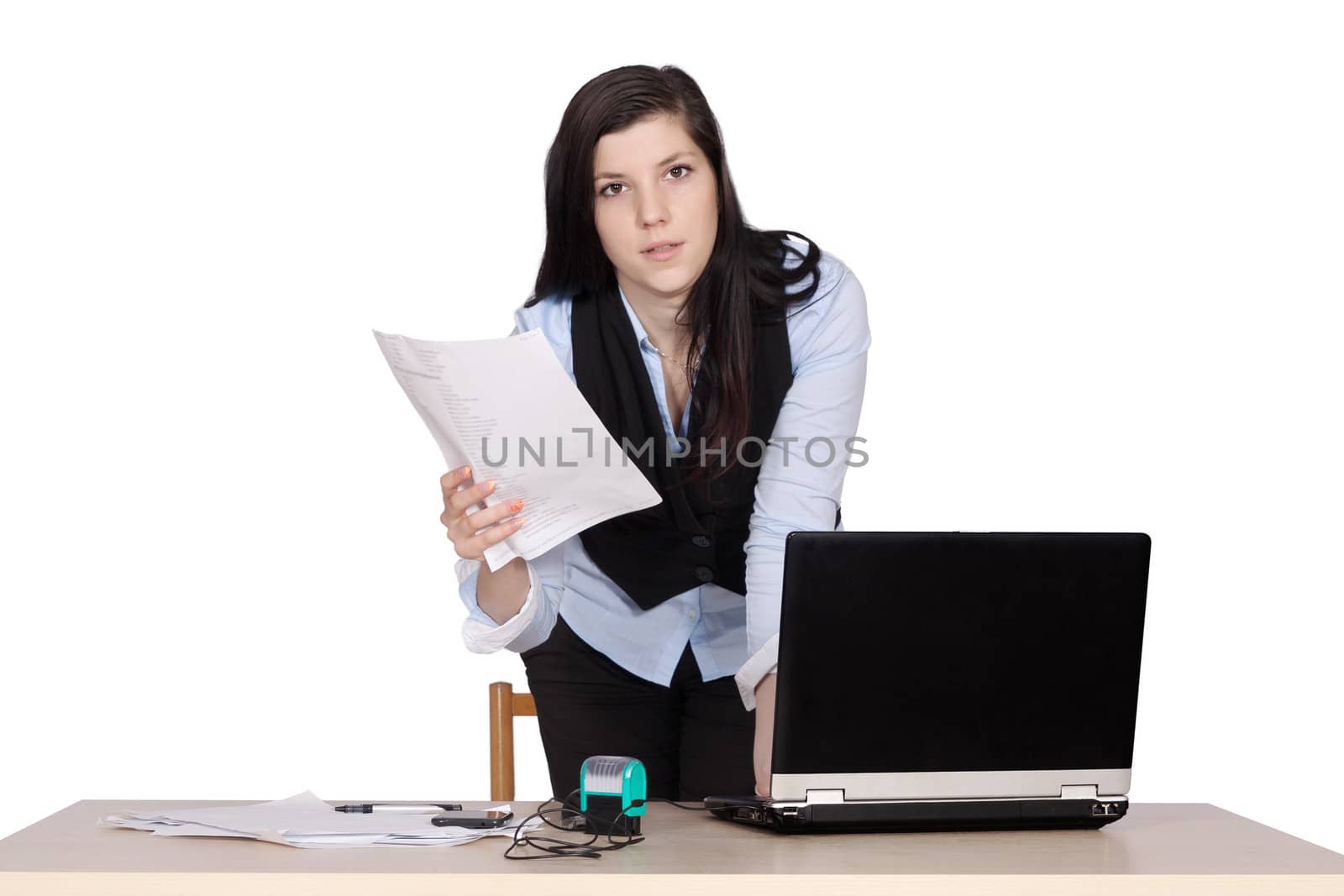 Young female boss at table with laptop holding papers in hand and explained, isolated on white background