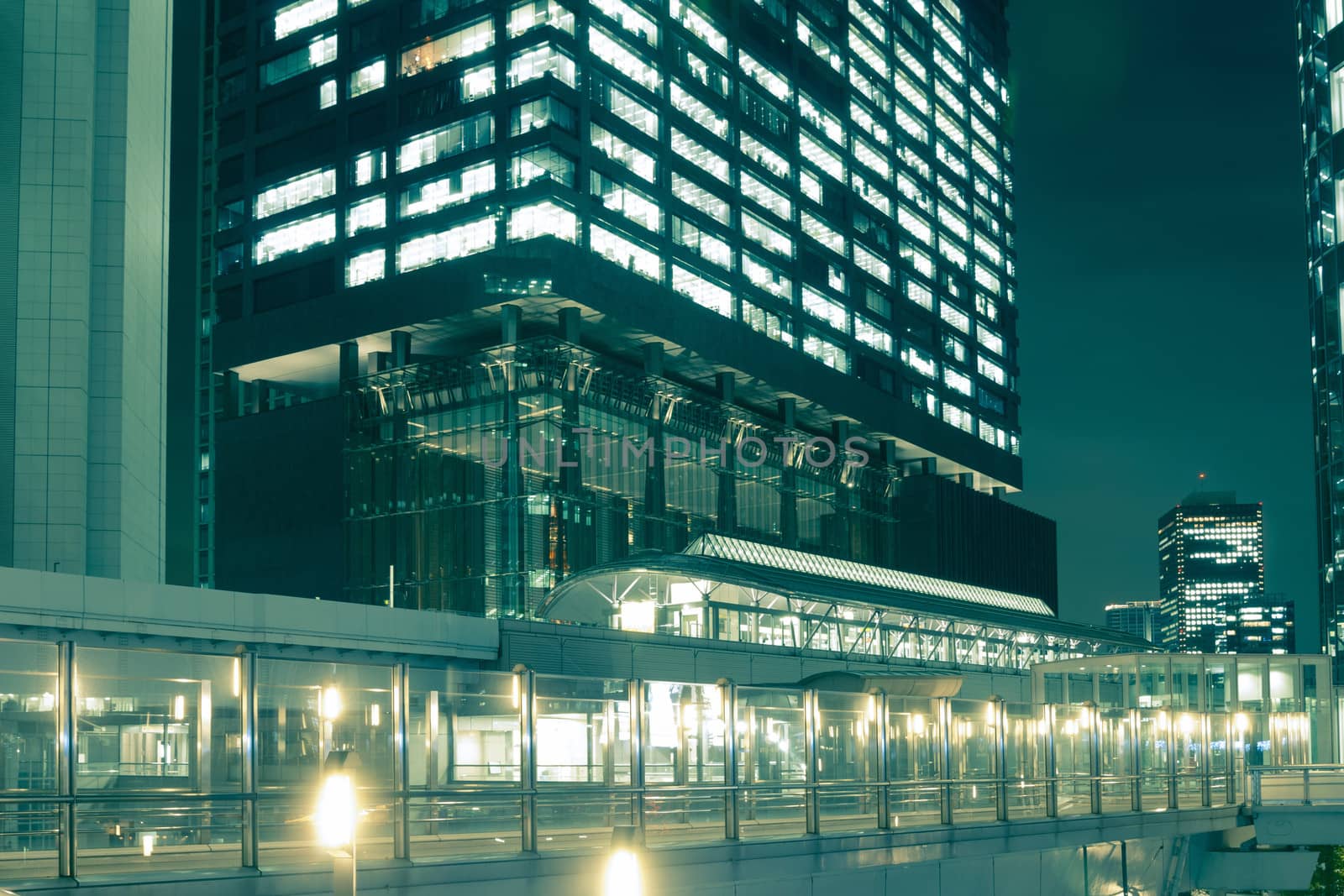 modern skyscrapers with illuminated pathways  in Tokyo Shiodome district