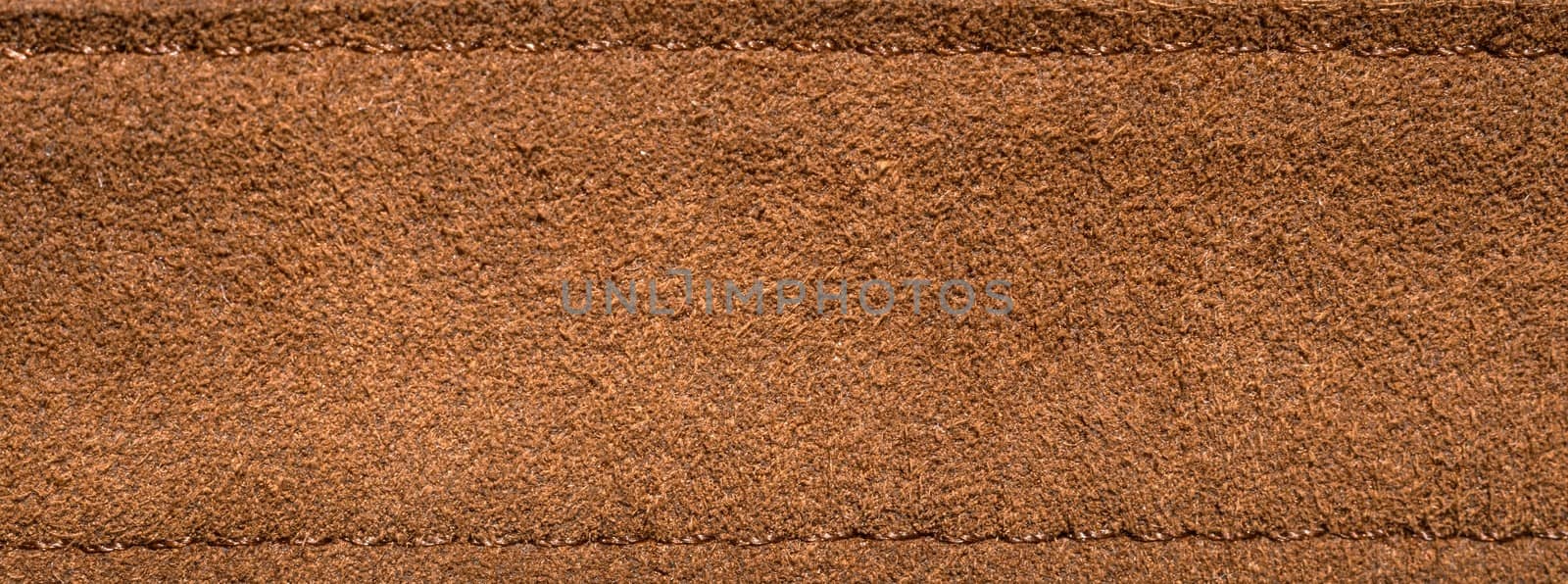 Texture of some brown leather closeup