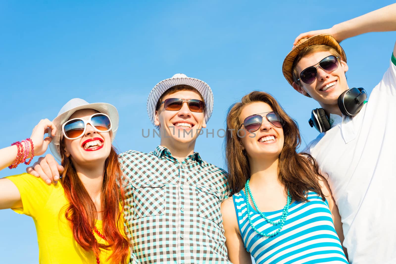 group of young people wearing sunglasses and hat by adam121