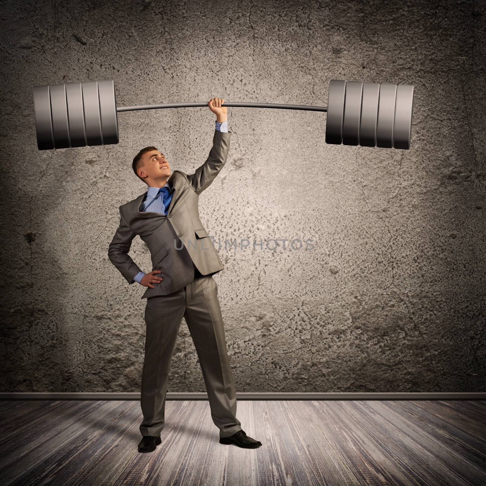 businessman holding a barbell with one hand, the concept of achievements in business