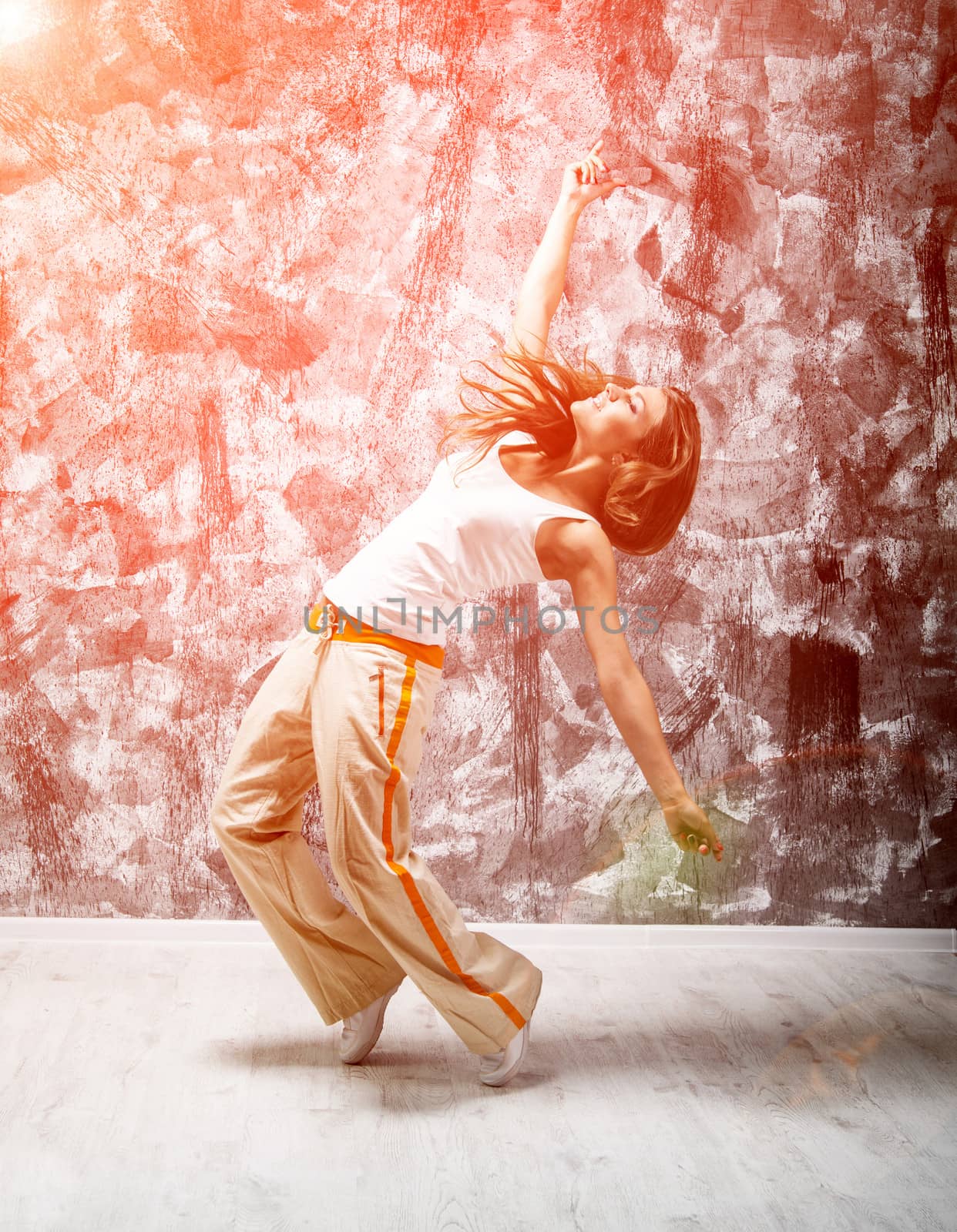 dancind girl on a gray grunge background