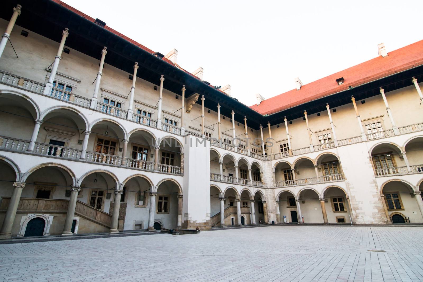 KRAKOW, POLAND - AUGUST 24: inner yard of royal palace in Wawel on August 24, 2013 in Krakow, Poland. The monument to the history of the Decree of the President Lech Walesa on September 8, 1994.