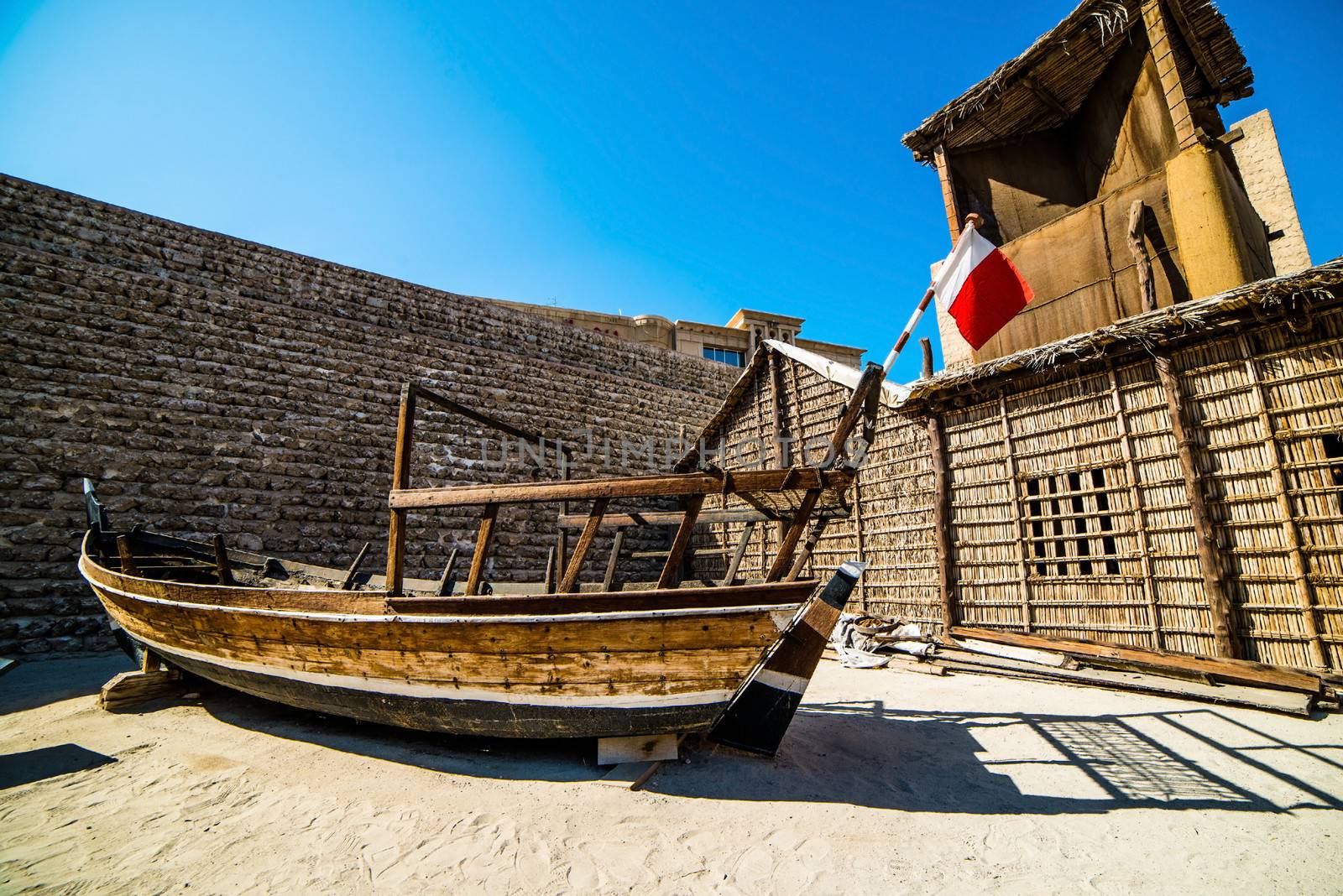 old boat on near fahidi fort, dubai, united arab emirates