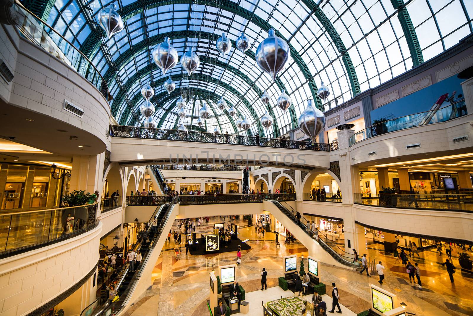 DUBAI, UAE - DECEMBER 19: Shoppers at Mall of the Emirates on December 19, 2013 in Dubai. Mall of the Emirates is a shopping mall before christmas in the Al Barsha district of Dubai.