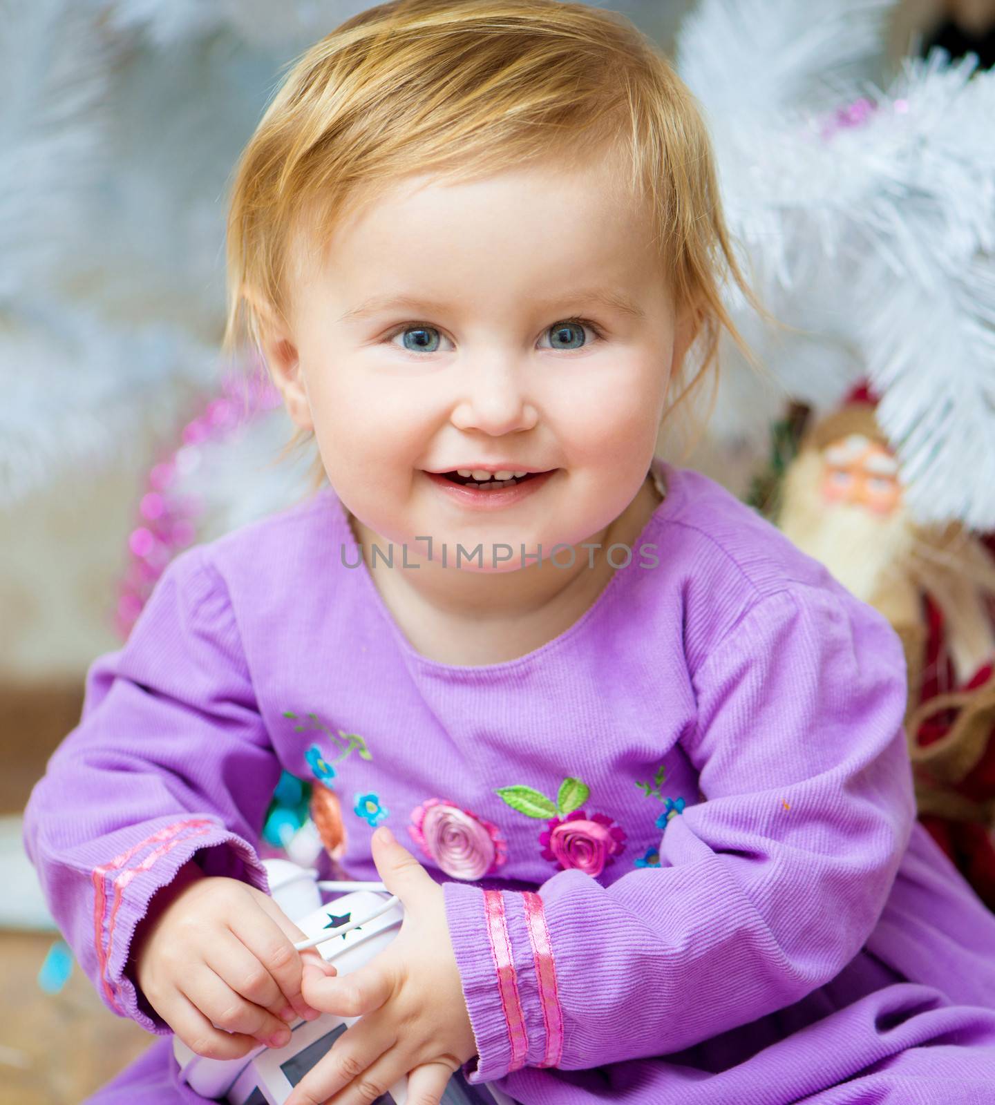 beautiful little baby holding a lantern