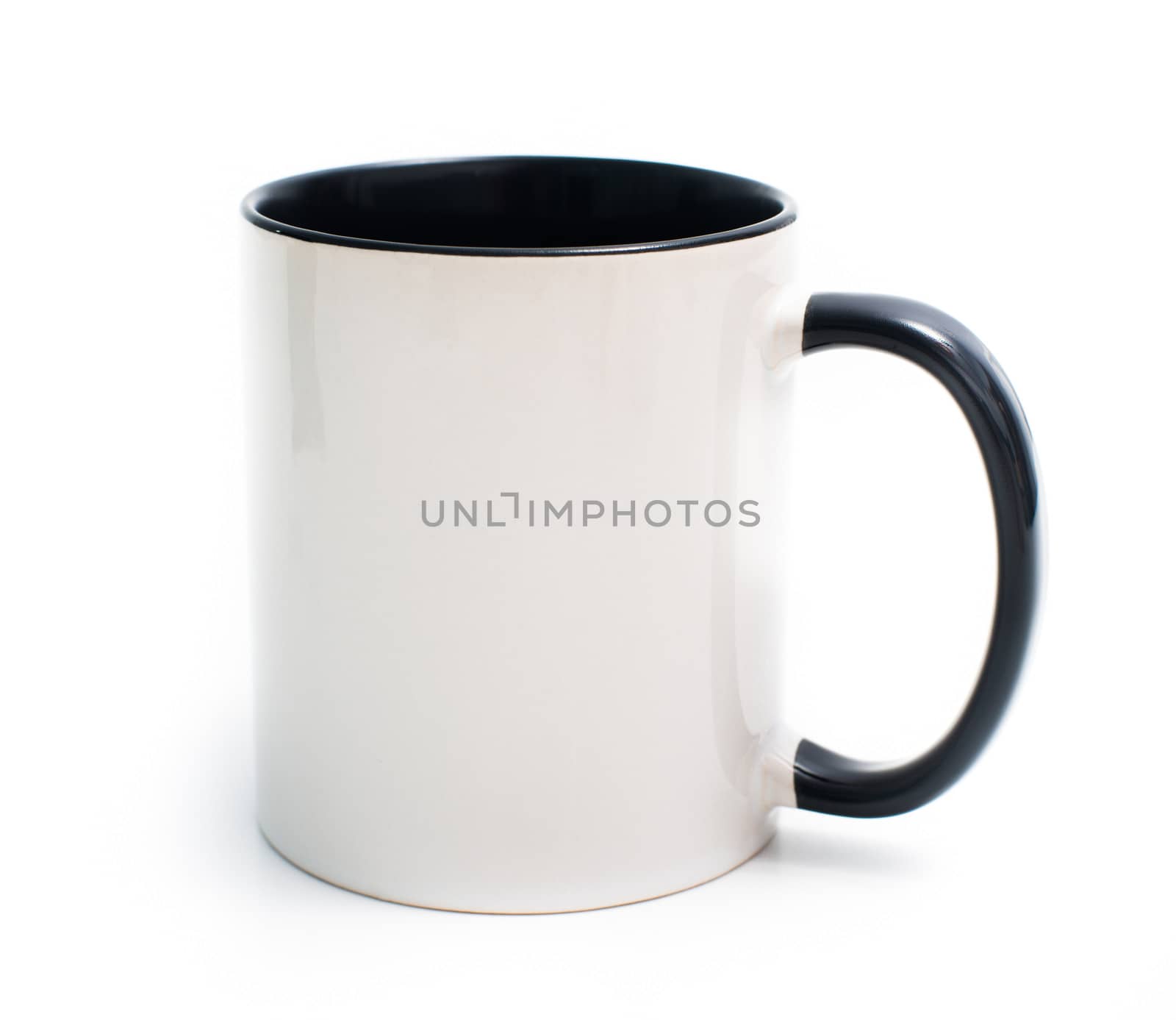 white mug with a black handle and an inner surface isolated on white background