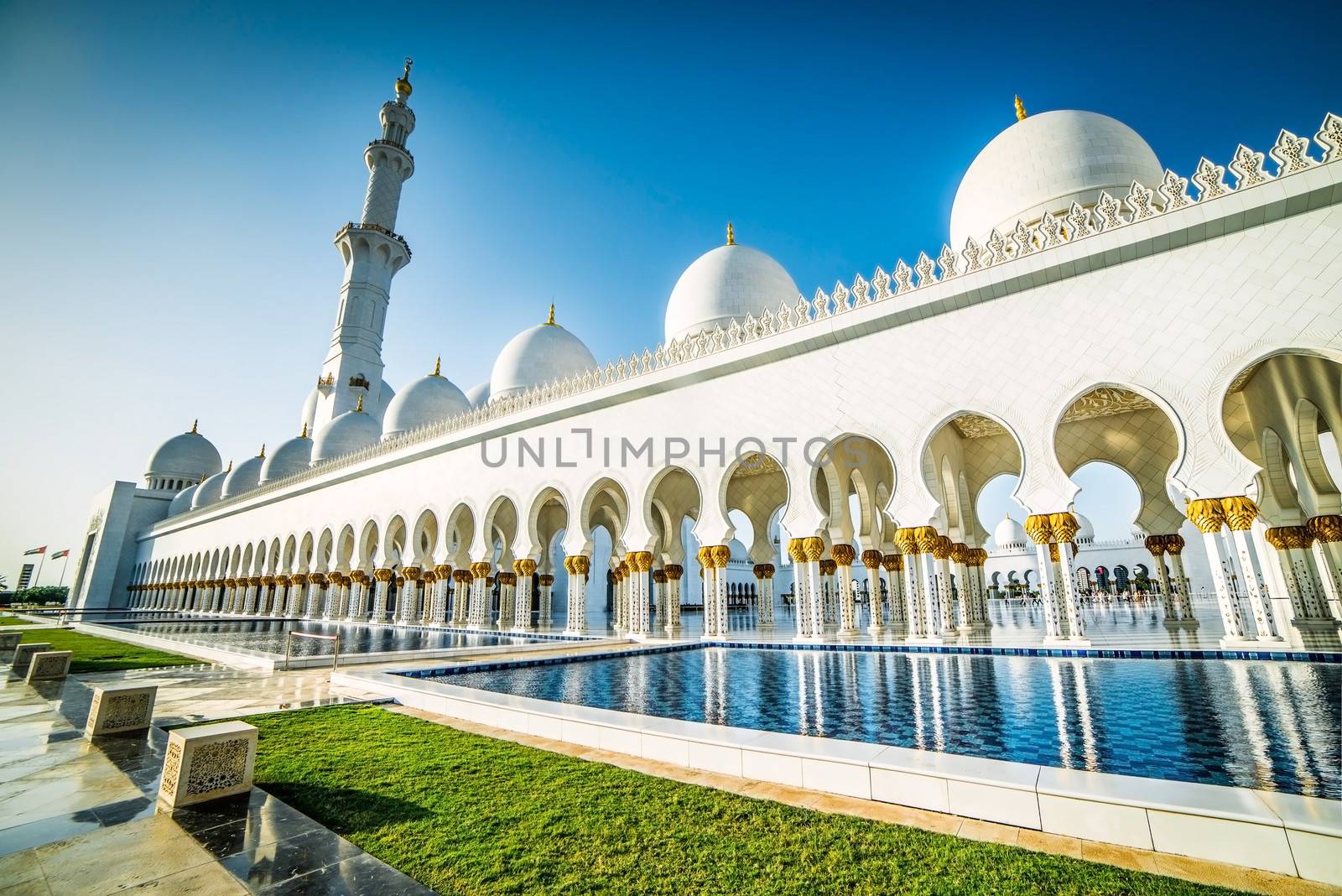 Sheikh Zayed Mosque in Middle East United Arab Emirates with reflection on water.