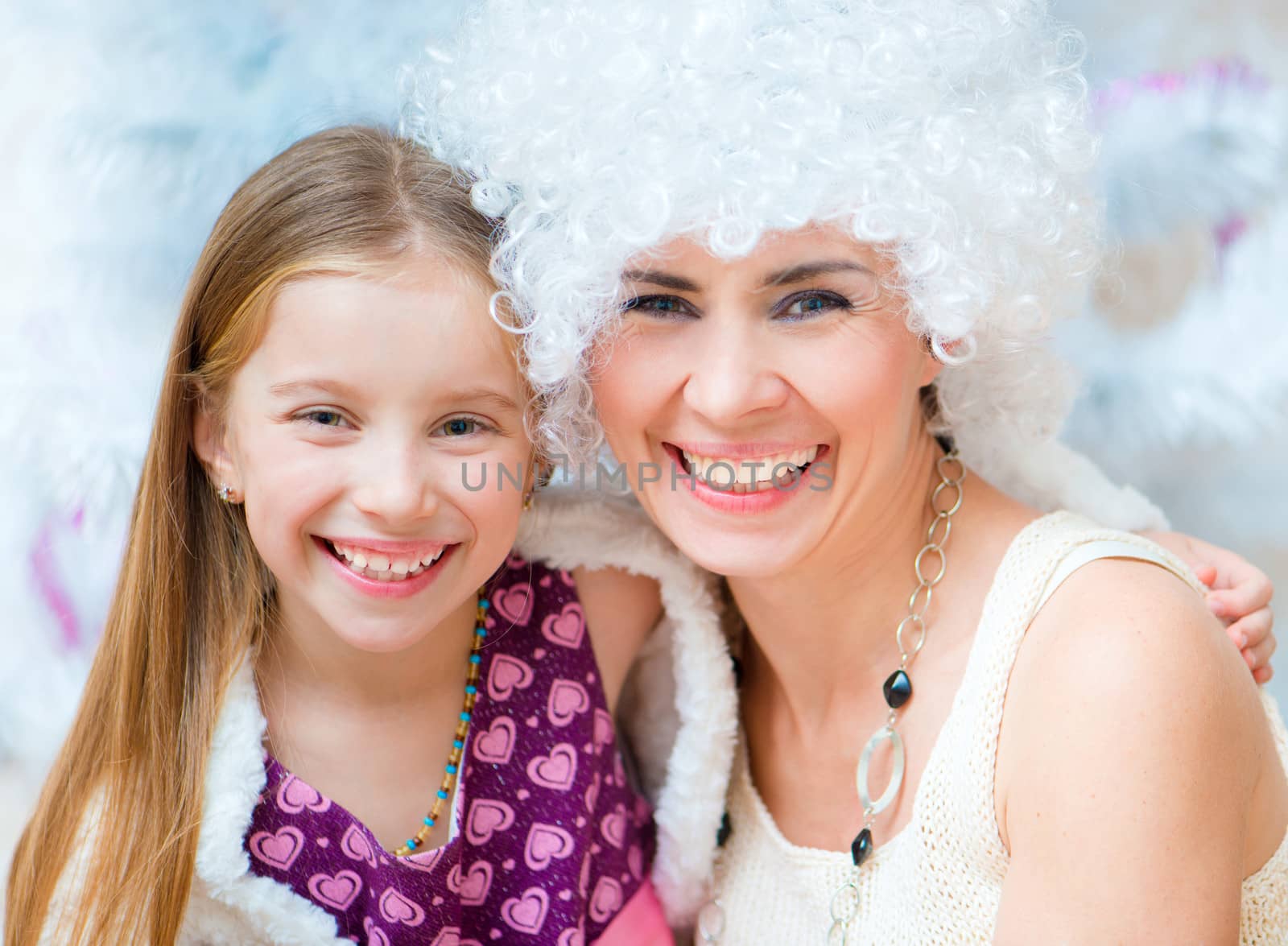 beautiful girl with white curly hair with her daughter