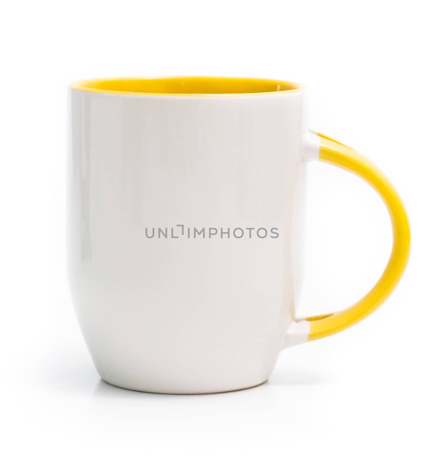 white cup with a yellow handle and an inner surface isolated on white background