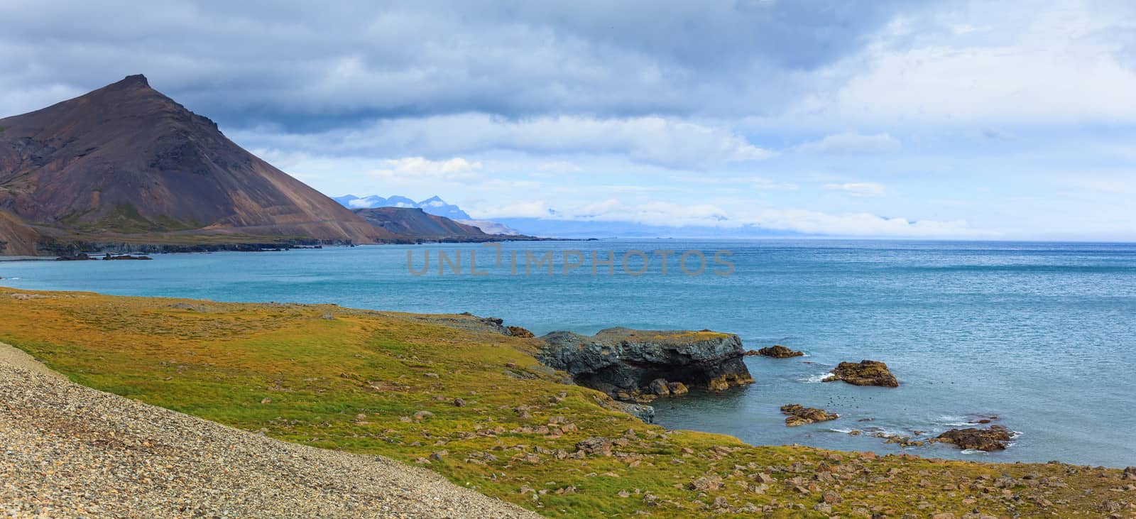 Cloudy sky over the coast in the East Fjords Iceland. Panorama