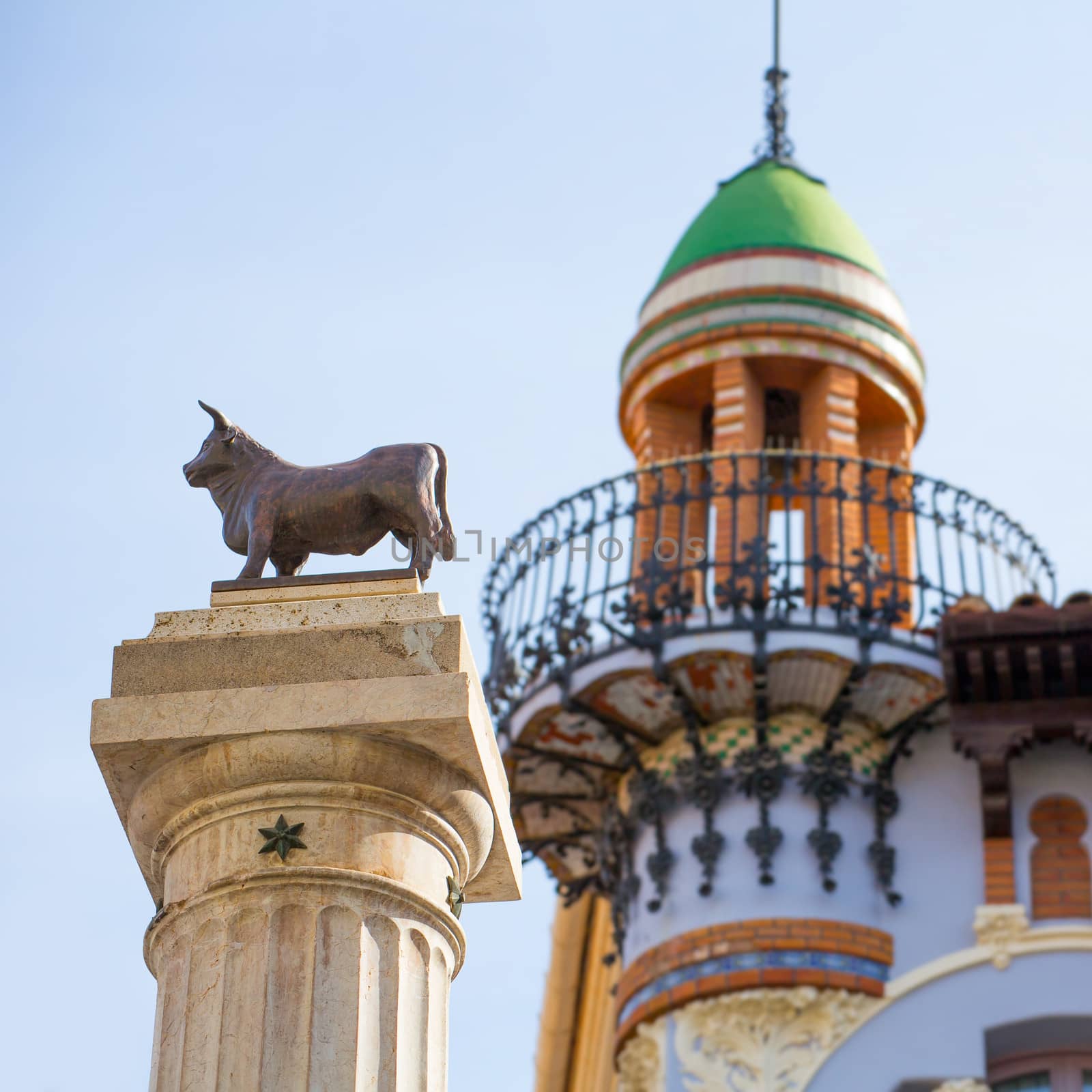 Aragon Teruel El Torico statue and modernist building in Plaza Carlos Castel square at Spain