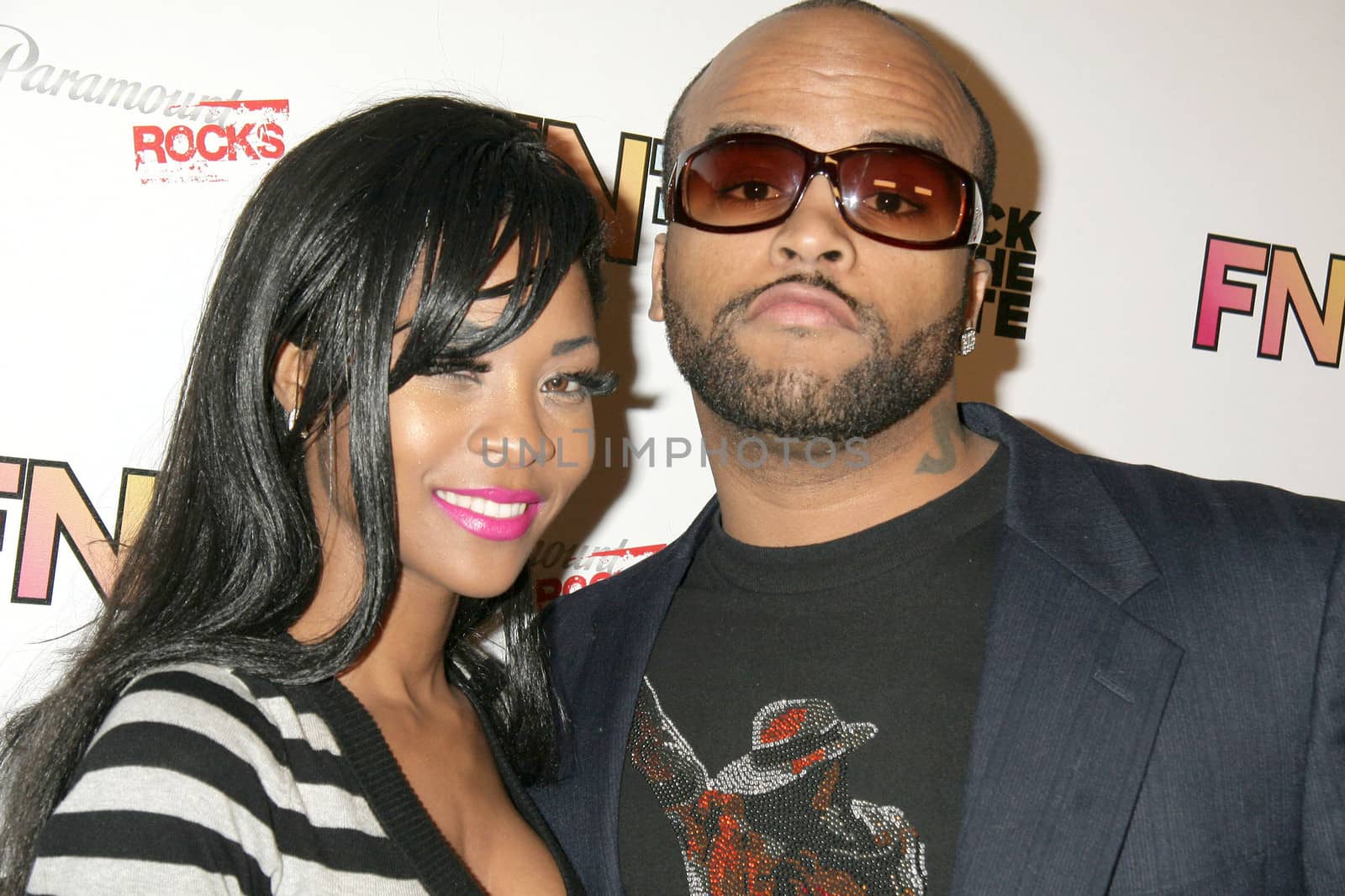 Ricky Romance and Ms. Williams at the "Friends and Family" Grammy Event, Paramount Studios, Hollywood, CA. 01-29-10/ImageCollect by ImageCollect