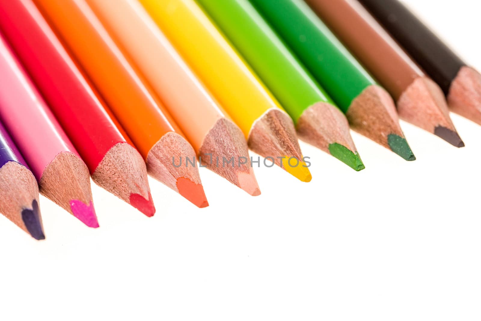 Colour pencils isolated on white background close up