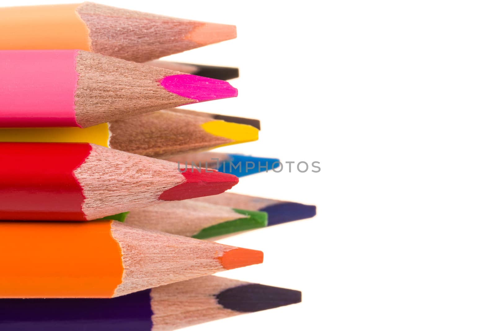 Colour pencils isolated on white background close up