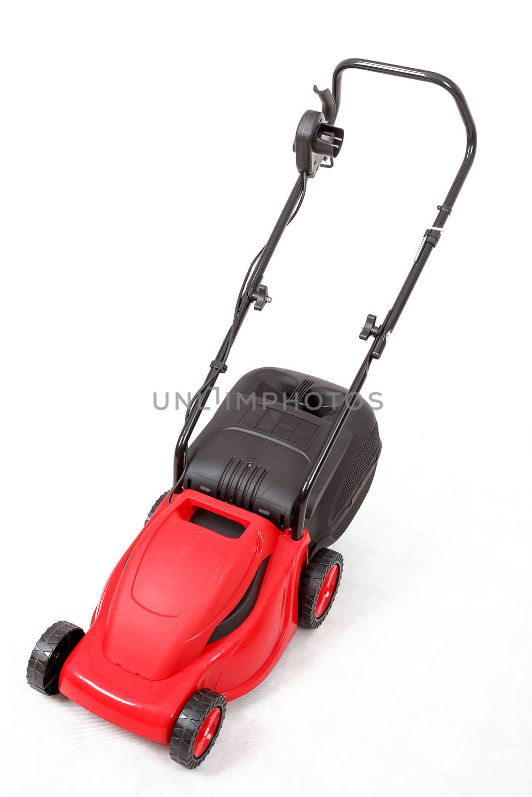 new red lawnmower isolated on white, studio shoot