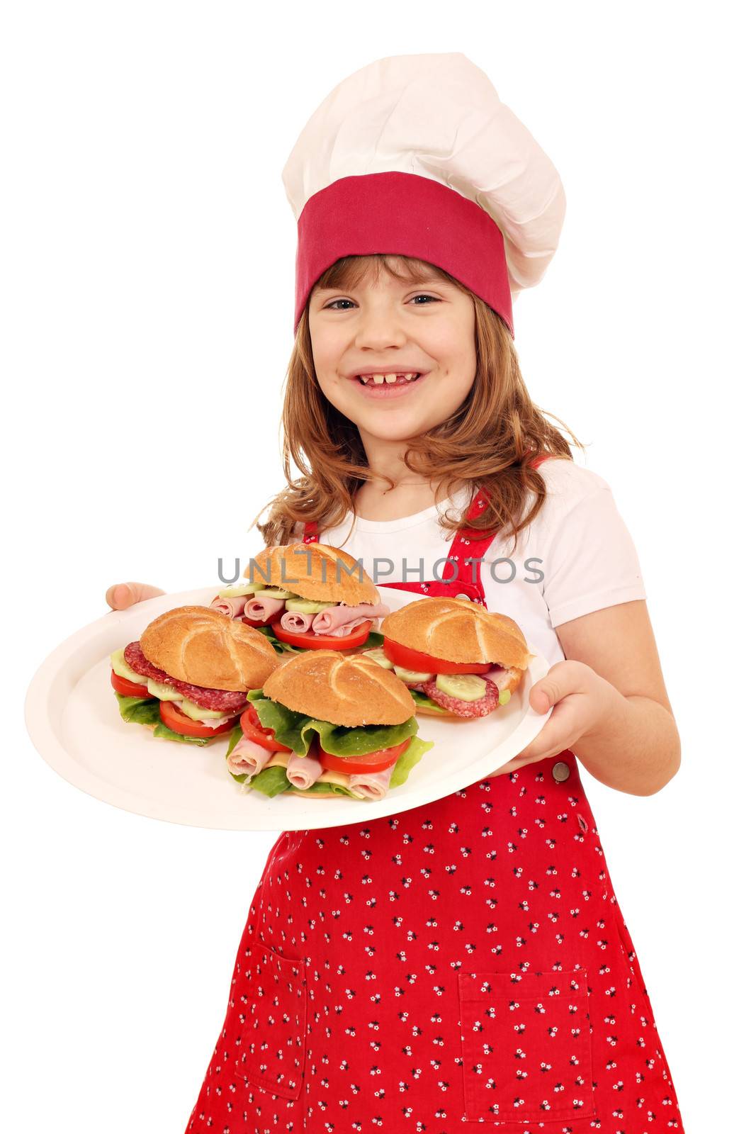 happy little girl cook hold plate with sandwiches by goce