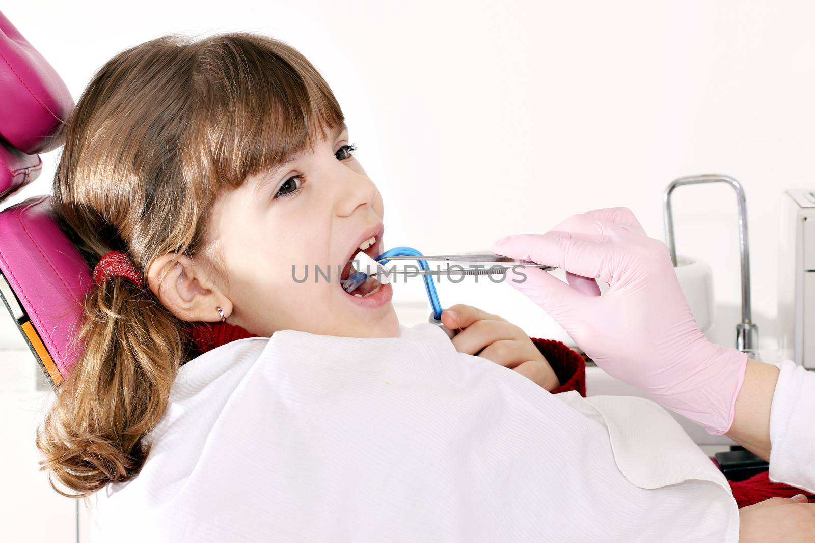 little girl patient at the dentist by goce