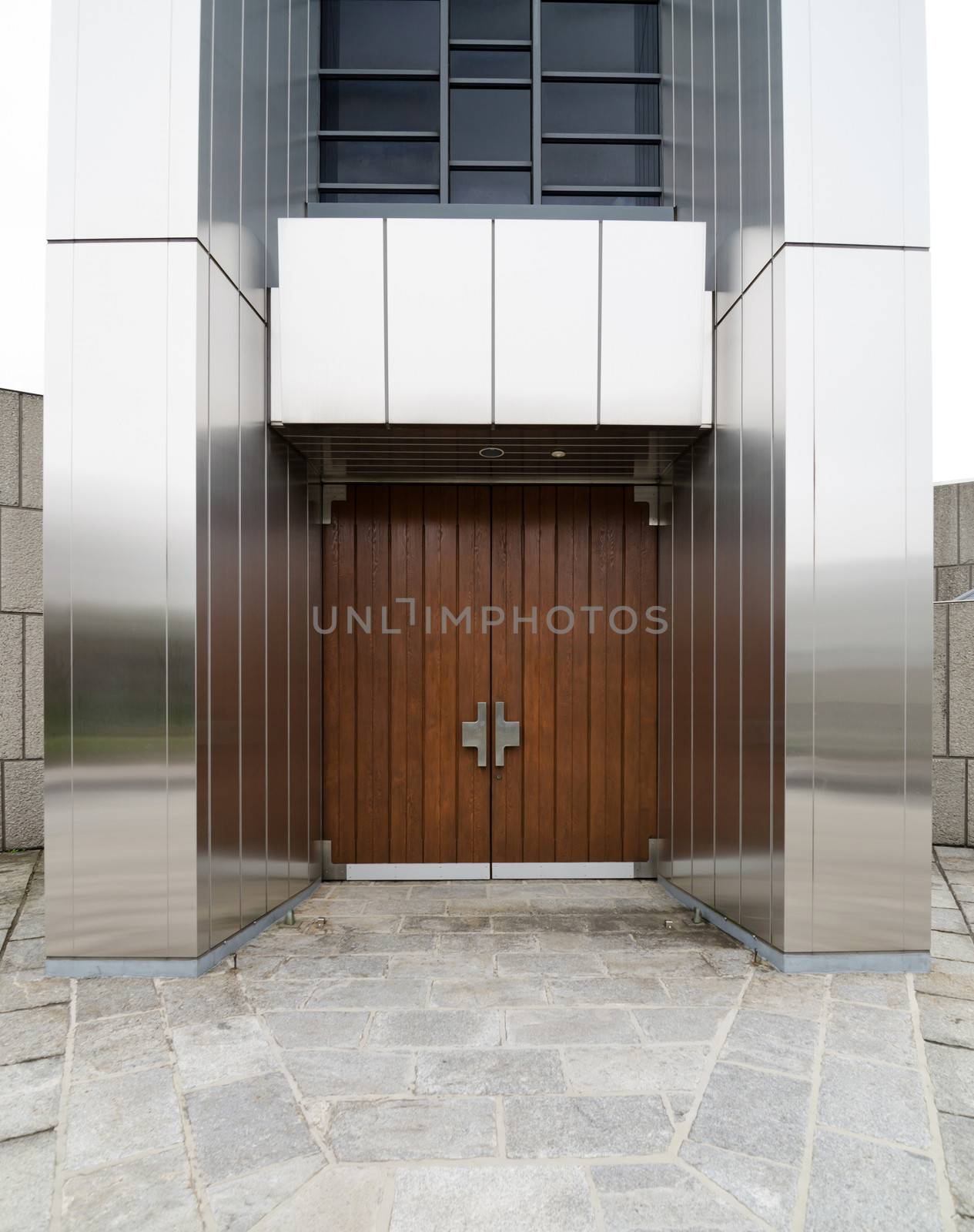 Wood door of modern building by siraanamwong