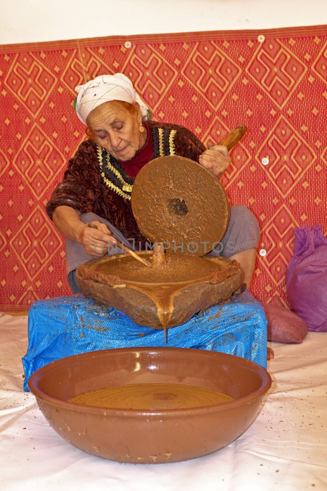 MOROCCO, OURIKA VALLEY - OCTOBER 24: Woman works in a cooperativ by devy