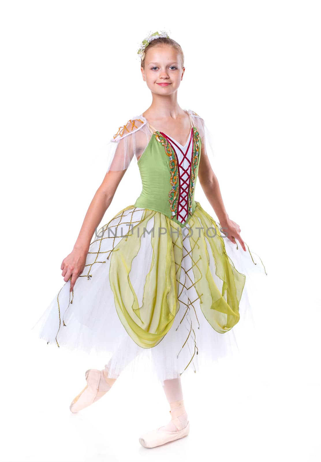 Beautiful young ballerina on a white background