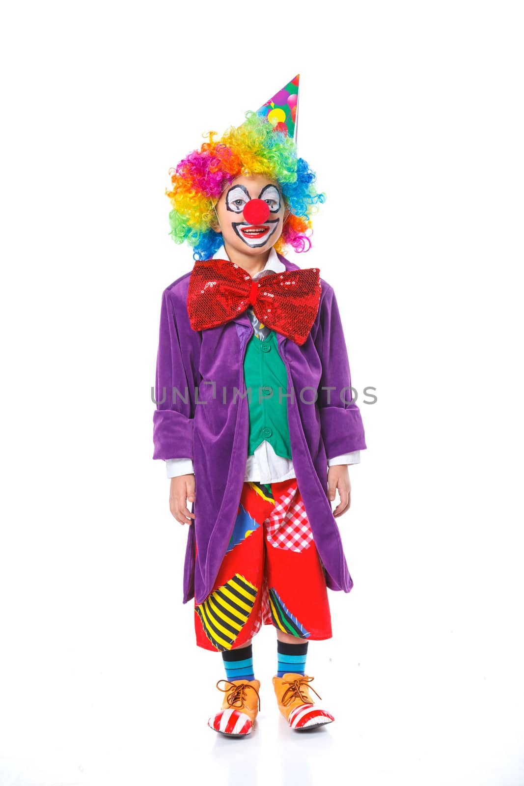 Cute boy clown. Isolated on white background.