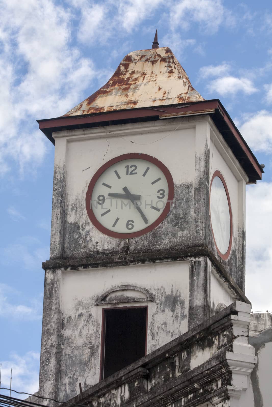 The old police station clock tower in Phuket town (vertical)