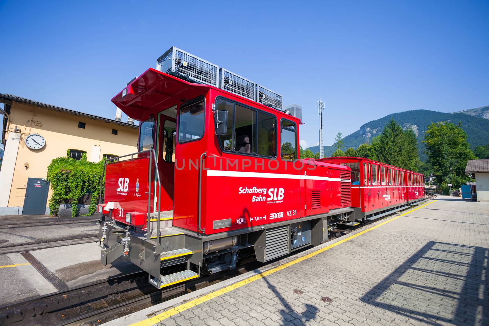 ST. WOLFGANG, AUSTRIA - AUGUST 6: Steam locomotive of a vintage cogwheel railway going to Schafberg Peak (1783m) on August 6, 2013 in St. Wolfgang.