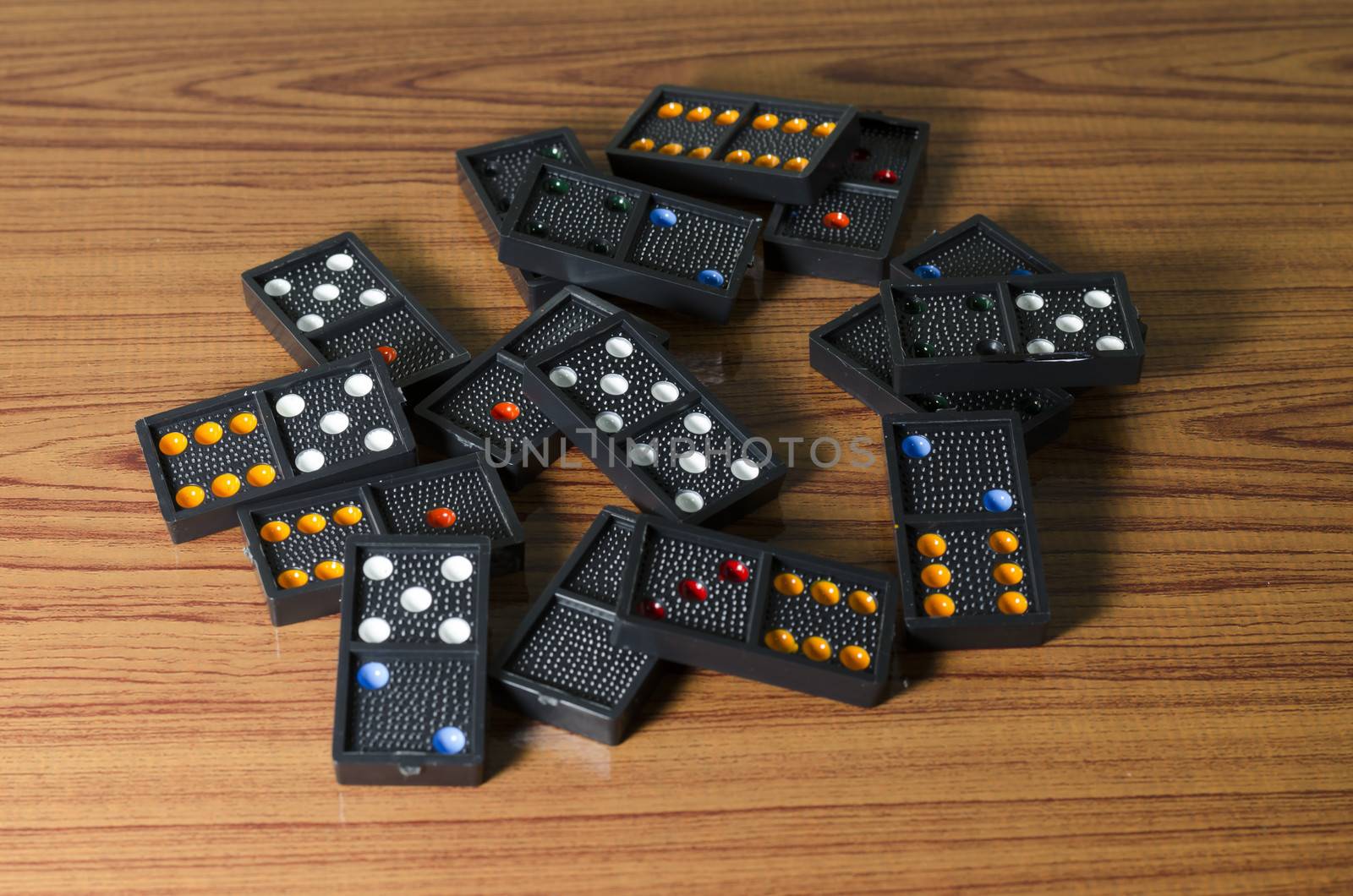 black domino on wooden background