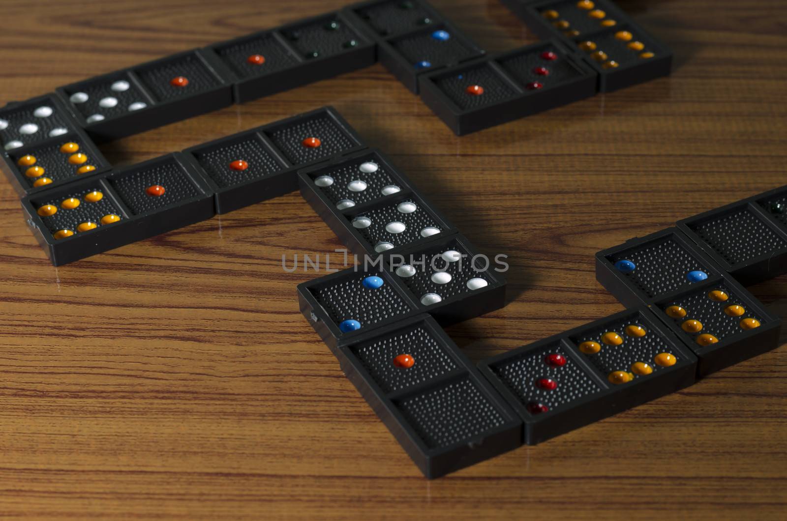 black domino on wooden background