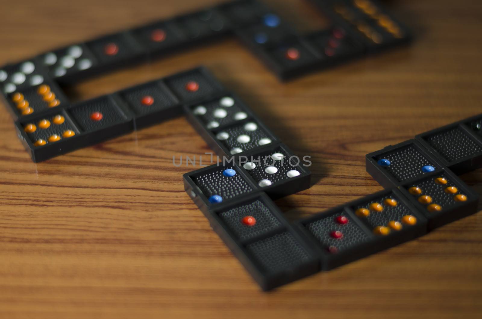 black domino on wooden background