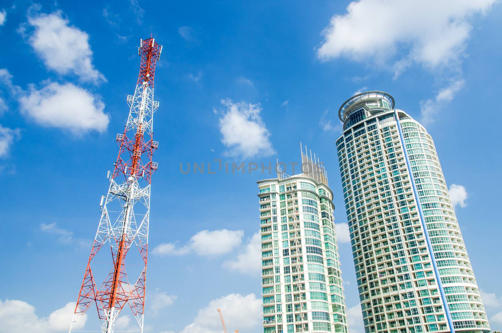 communication antennas, radio telephone mobile phone antennas on blue sky