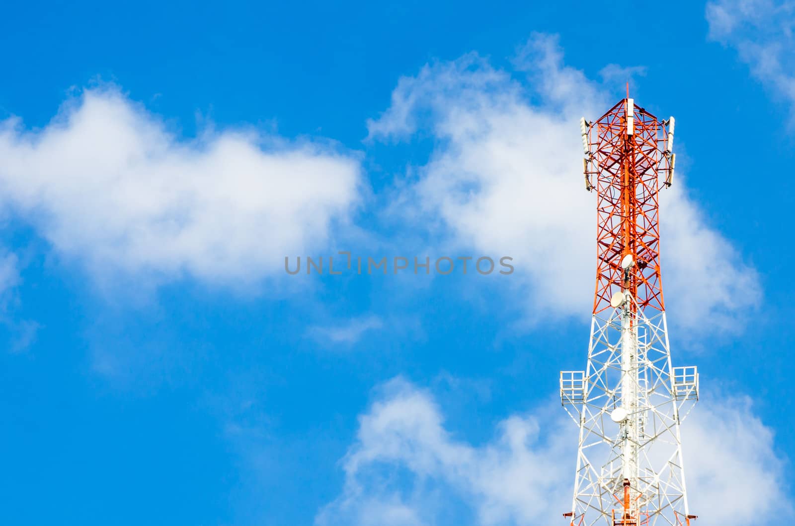 communication antennas, radio telephone mobile phone antennas on blue sky