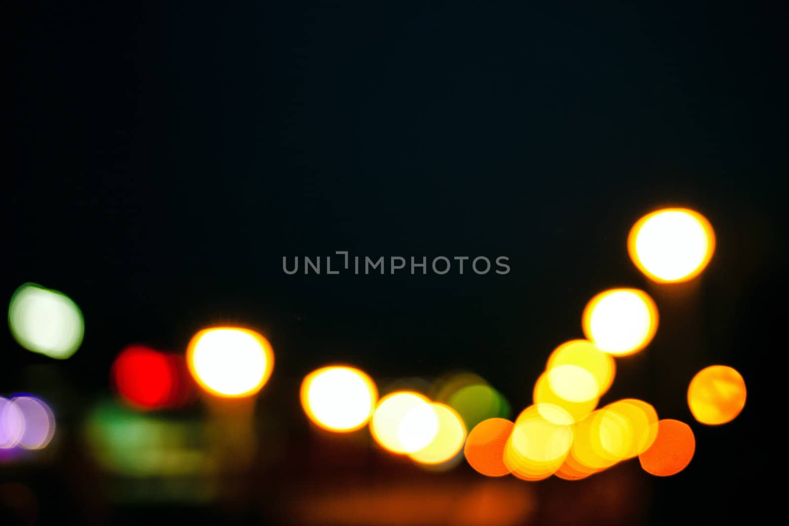 Abstract defocused lights of the night city bokeh background