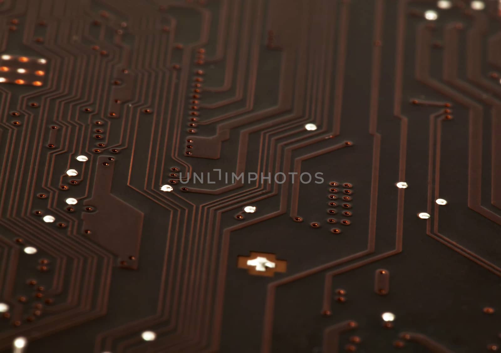 Laptop motherboard dark brown circuit background by RawGroup