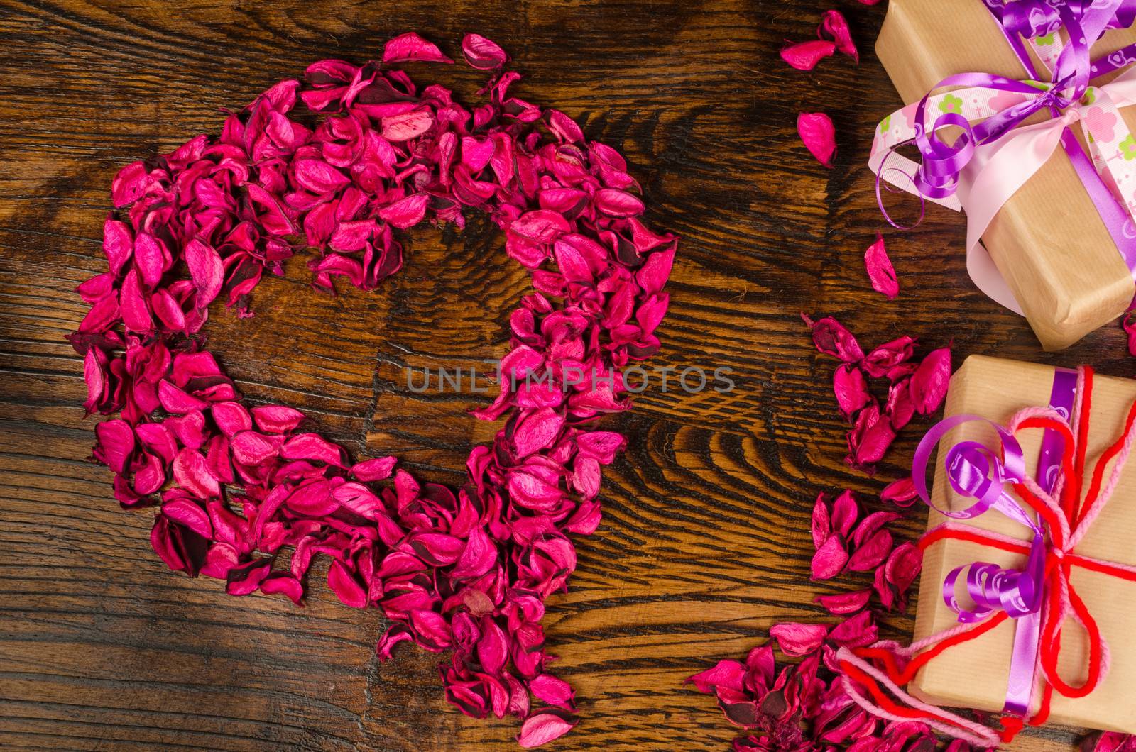 Floral Valentinte heart next to fancy gift boxes